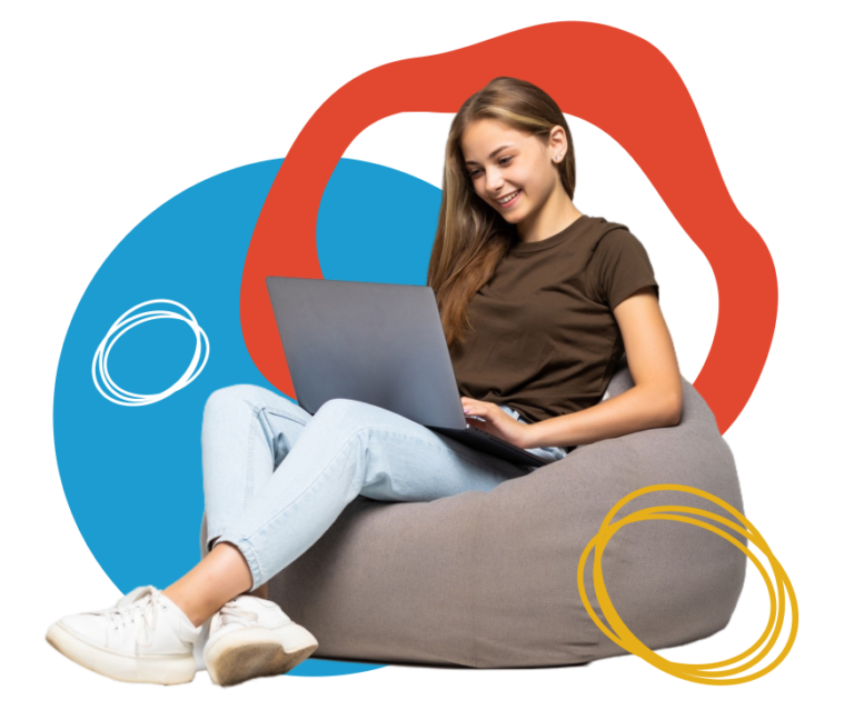 Woman with long hair in a brown t-shirt and light jeans, sitting on a gray beanbag, using a laptop, with a colorful abstract background.